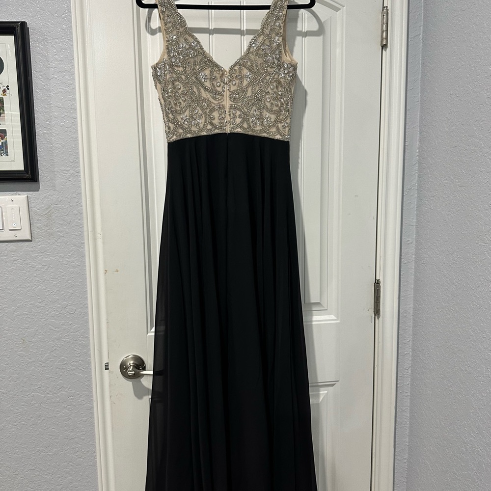 Floor length cream and black gown Aidan Mattox